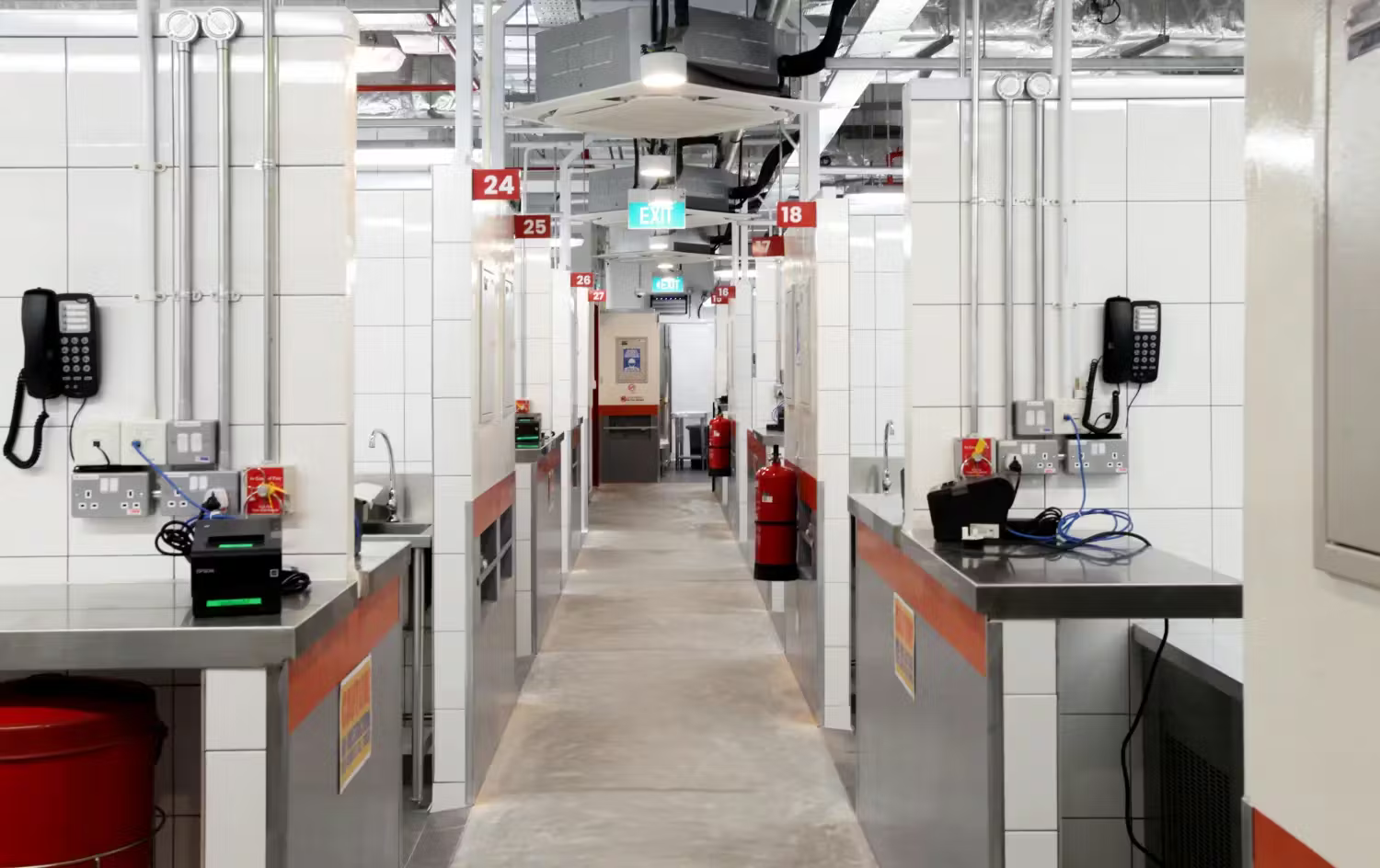 Corridor between food stalls in a central kitchen